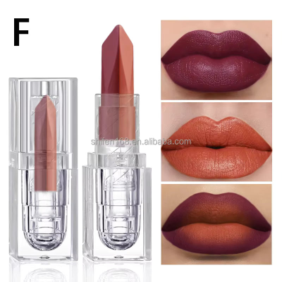 Three shades of matte lipstick in clear square tubes, shown alongside three close-up lip swatches of the same colors on human lips. The top-left corner has a black letter 'F'.